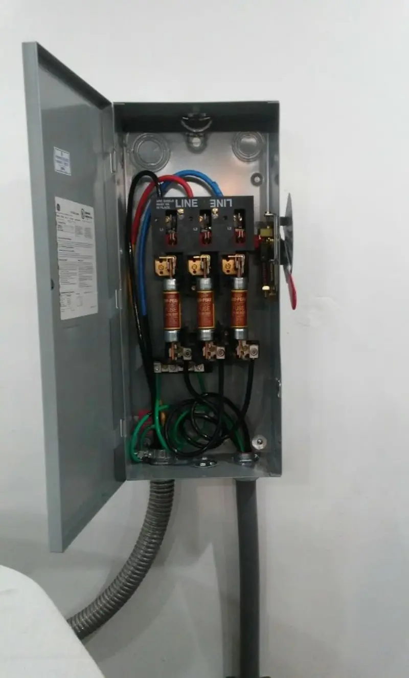 Three-phase disconnect switch installed for Smoke Detector Installation in Conroe